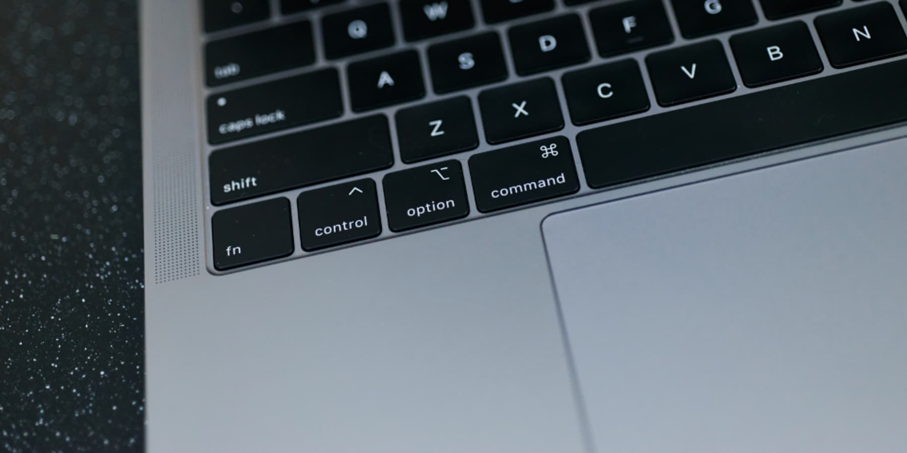 A close view of a laptop keyboard and trackpad, the device on which cookies are stored